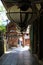 Cozy alley with traditional hanging lanterns and wooden buildings in Japan