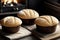 In the cozy ambiance of a fireplace, three loaves of bread are arranged elegantly.