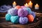 Cozy assortment of vibrant yarn balls on a wooden surface, illuminated by soft candlelight.