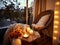 Cozy autumn balcony decor, warm fall city balcony decor with chair and pillows, pumpkins, yellow leaves and candles