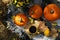 Cozy autumn concept with pumpkins outdoor, top view