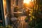 Cozy balcony or small terrace with simple folding furniture, blossoming plants in flower pots and light bulbs. Charming sunny
