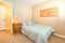 Cozy bedroom with twin bed, carpet and himalayan sea salt lamp o