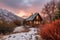 cozy cabin retreat with view of snow-capped mountains, surrounded by majestic peaks