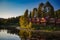 Cozy cabins in the forest near river