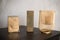 Cozy candles on an wooden table in home interior closeup