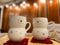 cozy Christmas celebration atmosphere for couples with snowman mugs