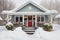 Cozy christmas cottage with festive decorations and delicate wreath in snowy surroundings