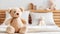 Cozy Comfort Plush Bear Toy Adorns Children\\\'s Room Bed - Generative AI