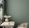 Cozy dark green workplace interior at home, wall mockup