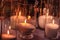 Cozy decor with candles burning in glass flasks