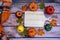 Cozy fall autumn concept featuring wooden cutting board for copy