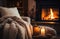 cozy fireside of a living room with a wool blanket and candles for a warm and cozy winter setting