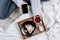 Cozy flatlay of bed with wooden tray with vegan apple pie, ice cream and black tea