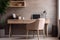 Cozy home workplace with wooden drawer writing desk and fabric chair. Interior design of modern Scandinavian home office