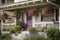 cozy house exterior with flower boxes and hanging baskets, bringing color to the front porch