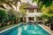 cozy house exterior with swimming pool and lush garden, offering a relaxed and serene atmosphere