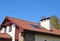 Cozy house Roofing with Vacuum Solar Water Panel Heating, Solar Panels, Skylights Outdoor.