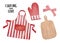 Cozy kitchen collection with wood cutting board, bright striped apron, cotton potholder glove.