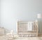 Cozy light blue nursery with natural wooden furniture