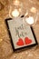 Cozy love date greeting card with hearts, candles, warm lights