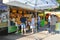 Cozy market on` De Groeneplaats` square in city `Den Burg` with booth selling dutch cheese