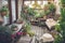 cozy outdoor patio with mini garden, filled with plants and flowers