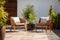 Cozy outdoor roof terrace or patio with armchairs and potted plants