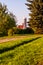 Cozy park walkway on the hill with skyline view on Vilnius churches and modern buildings cityscape