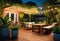 Cozy patio in the back garden with wooden decking, tropical plants and plunge pool. modern design of a place to relax at home,