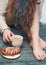 Cozy photo of woman feet with tea and cake