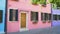 Cozy pink house with flowerpots, beautiful colorful building in Burano, Venice