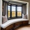 A cozy reading nook inside a bay window with built-in bookshelves and a cushioned bench5