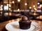 Cozy restaurant: warm neutral detailed chocolate dessert.