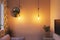 Cozy retro living room modern interior with colorful furniture, Hanging light bulb and modern style decoration closeup