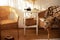 Cozy Skandinavian interior home with wicker rattan armchairs in living room. Rattan chair and wooden table in bedroom. Rustic inte