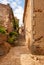 Cozy streets of Tossa De Mar, Catalonia, Spain. Picturesque little town near Barcelona. Famous tourist destination Costa Brava.