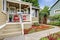 Cozy walkout deck with red chairs