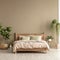 Cozy wooden bed near beige wall. Scandinavian interior design of modern bedroom with greenery