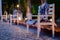 Cozy Wooden Benches in Row on Stone Patio