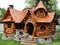 A cozy wooden dog house in a serene garden