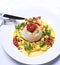 Crab Stuffed Flounder with tomatoes ad cream sauce