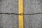 Crack on line yellow on road texture