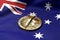 Cracked Bitcoin coin on Australian flag. Bad Bitcoin condition in Australia concept. 3D Rendering