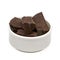 Cracked chocolate blocks in bowl