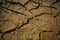 Cracked dry soil during drought texture background