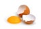 Cracked egg with egg shell, egg yolk and egg white
