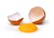 Cracked egg with egg shell, egg yolk and egg white isolated