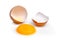 Cracked egg with egg shell, egg yolk and egg white isolated