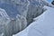 Cracked glacier with icicles. Gran Paradiso Massif.